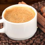 Coffee flavoured with cinnamon and hazelnut